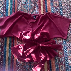 Maroon color top. Only wore this twice and does not fit anymore